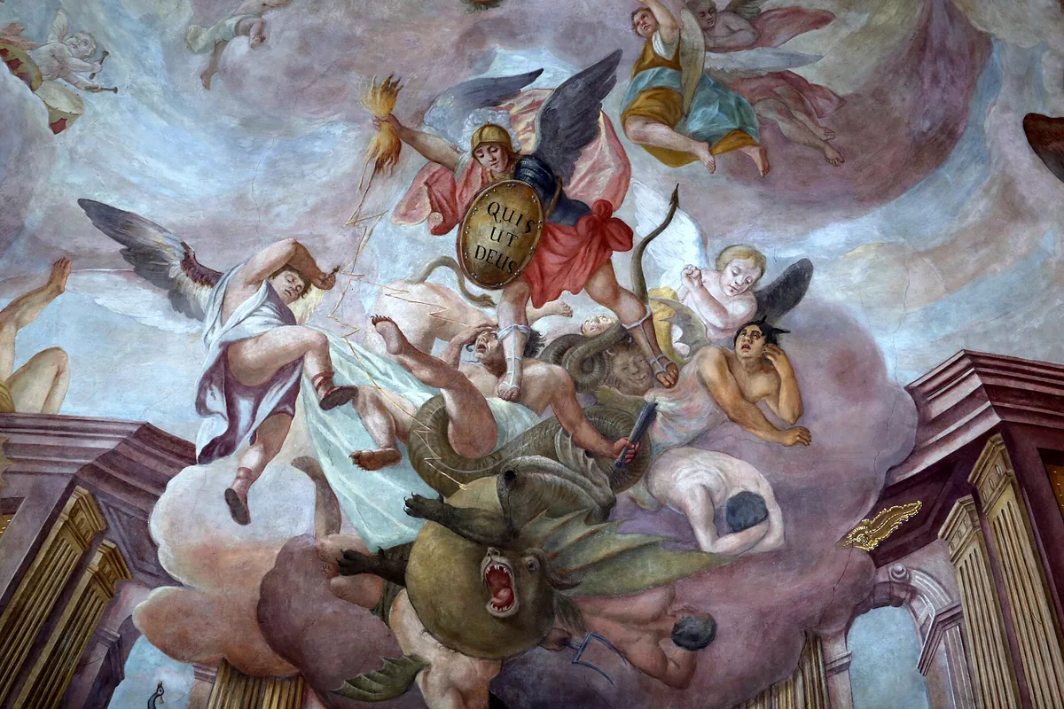 A ceiling fresco showing an angel in armour with a shield casting down a monstrous figure among clouds